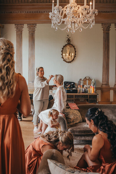 bride has her makeup done