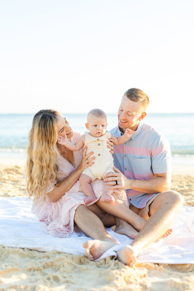 family posing for photo on lanikai beach