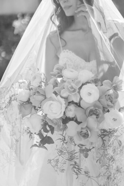 Bridal portrait holding a bouquet under veil, Florida wedding photographer, Renee Lemaire photography