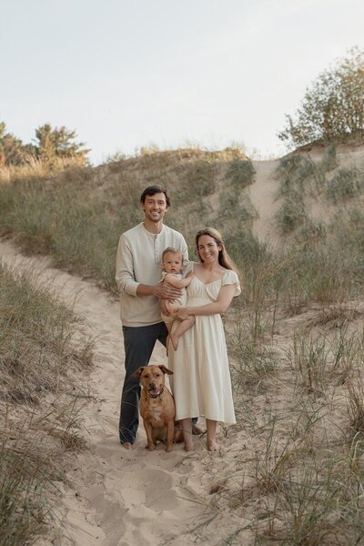 Family walking through the dunes photographed in Traverse City Michigan
