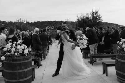 black and white image bride and groom posing