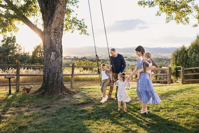 family poses for portrait session with JM Visual Art Co