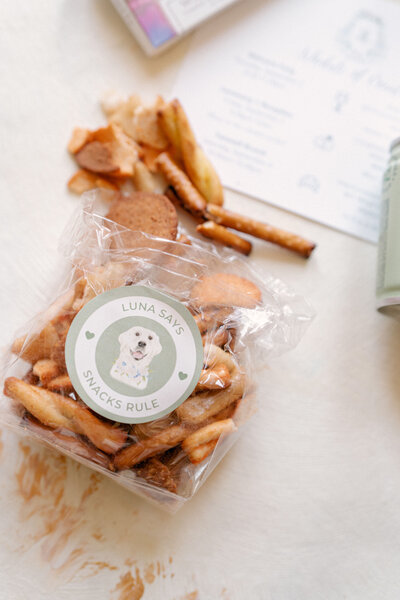 Watercolor pet portrait sticker on a pack of salty snacks for an adorable wedding welcome gift!