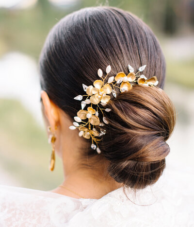 Golden floral bridal hairpiece, by Joanna Bisley Designs, romantic and modern wedding jewelry based in Calgary, Alberta.  Featured on the Brontë Bride Vendor Guide.