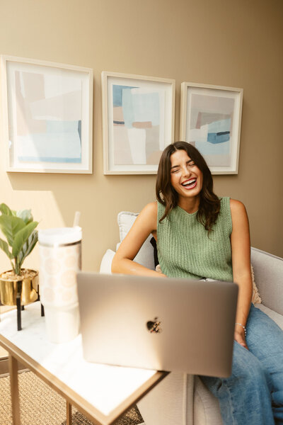 a therapist smiling during a virtual session