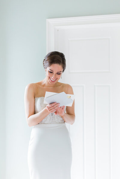 Bride Opening Letter from Groom on Wedding Day