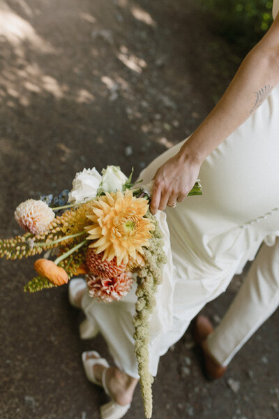 detail photo of bridal bouquet captured during their alberta wedding