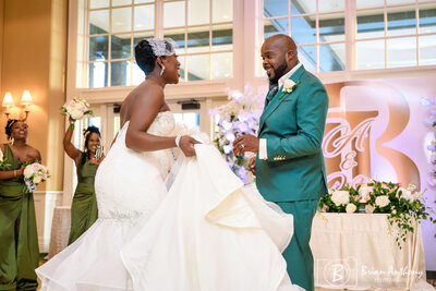 Bride and groom enjoying their first dance, planned by a luxury wedding coordinator.