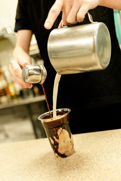 Phoenix donut shop making iced coffee drink