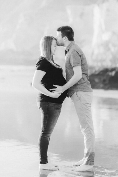 Expecting mother with her husband in Pismo Beach 