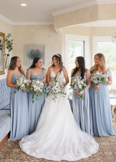 bride and her wedding party at perry house in monterey