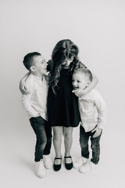 Extended family laughing in field  | Sharon Leger Photography