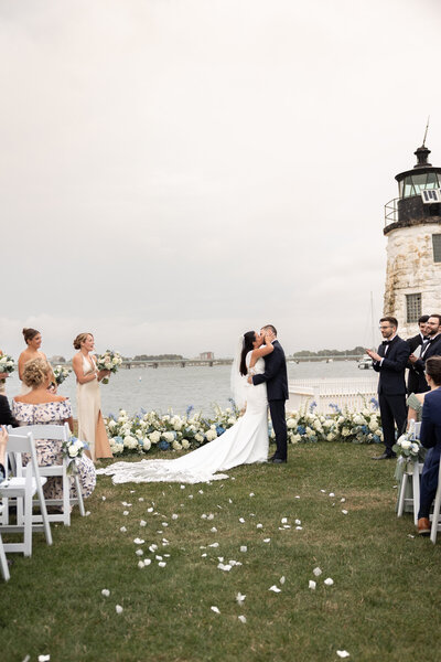 engagement photo of couple on beach in cape cod dancing