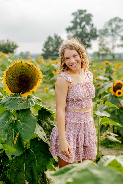 high school senior in sunflowers