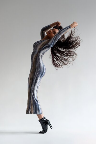 woman arching back in studio