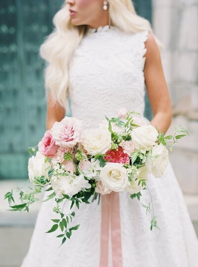 Bride and groom walk up memorial steps at their DC wedding
