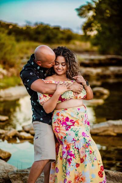 Couple embracing each other during photoshoot