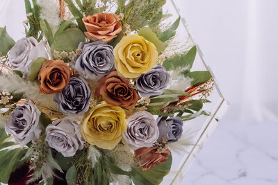 14" hexagon of crystal clear resin with preserved roses and pampas grass