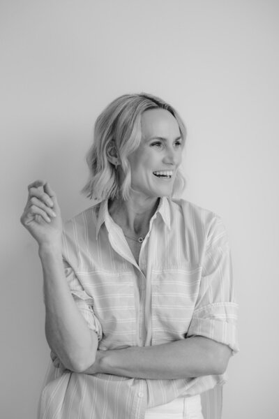 Zelda Green, podcaster, financial educator, photographer looking professional while smiling off camera