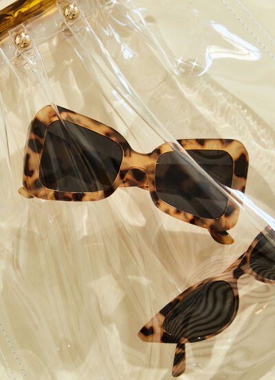 sunglasses in a clear bag