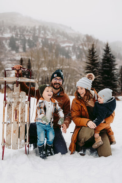 Couple shares a kiss after their mountaintop elopement in Ouray, Colorado.