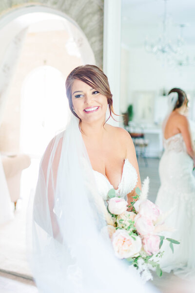 Bride in getting ready room taken by Kansas City wedding photographer