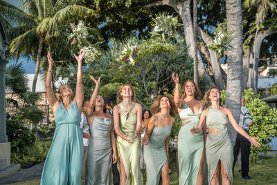 wedding photography big island hawaii of bridesmaids wearing multi-colored dresses