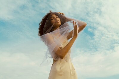 NYC Photographer image of woman modeling with fabric ADP Studio