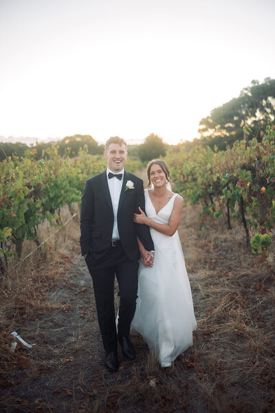 detail shot of brides sunglasses jewelry shoes and veil