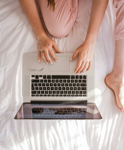 laptop displaying a photographer seo keyword spreadsheet by melissa arlena