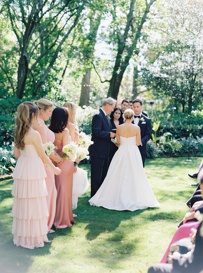 Light filled wedding ceremony in the garden at Governor Thomas Bennett House.
