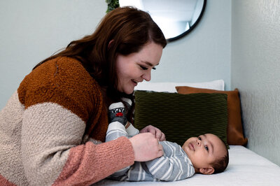 Ashley King does newborn check at Joyful Beginnings birth center