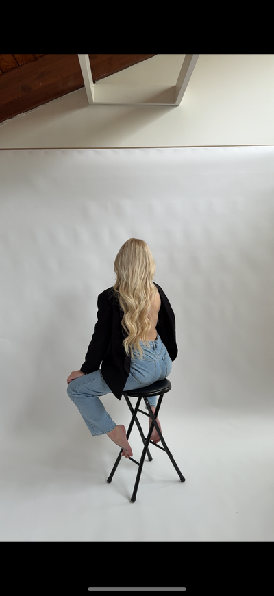 the glover park hotel washington dc, aesthetic poses, aesthetic hotel photography, little black dress, holding wine glass, gold wine glass, long blonde hair, aesthetic hair