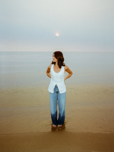 couple getting married on top of cliff overlooking water