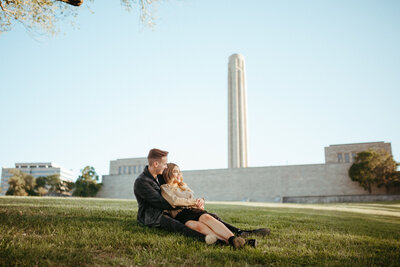 city engagement, young couple, liberty memorial, field photoshoot, kansas city engagement, kansas city couple