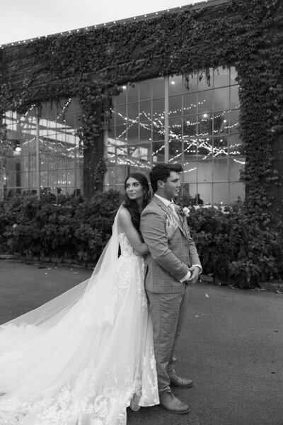 black-white-portrait-ofbride-hugging-groom-emily-snyder-photography-texas-destinations