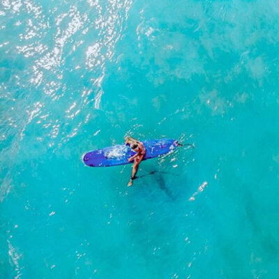 kellyyhill_drone_girl_surfing_puerto_rico