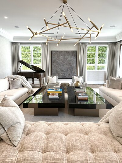 A neutral and luxurious bedroom design by DLT Interiors, a Miam-based interior design firm.