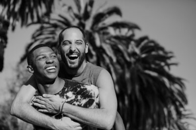 Smiling gay couple