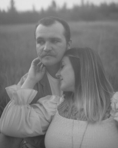 Candid engagement session in Spokane, Washington, capturing the laughter and connection between a couple in love.