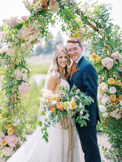 Kelsey and Michael’s English garden-inspired wedding florals with lush greenery, layered blooms, and natural elegance by Summer Robbins Flowers in Bend, Oregon
