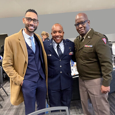 Family law attorney standing next to two military members in Central Ohio