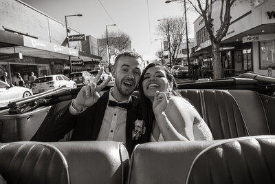 Bride and groom exchanging vows during their Adelaide wedding ceremony, captured by JakeyVass Media