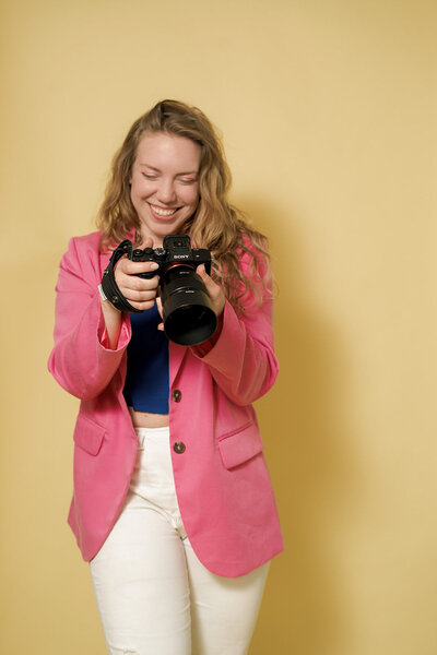 lauren schoepfer lascho brands headshot laughing looking at camera