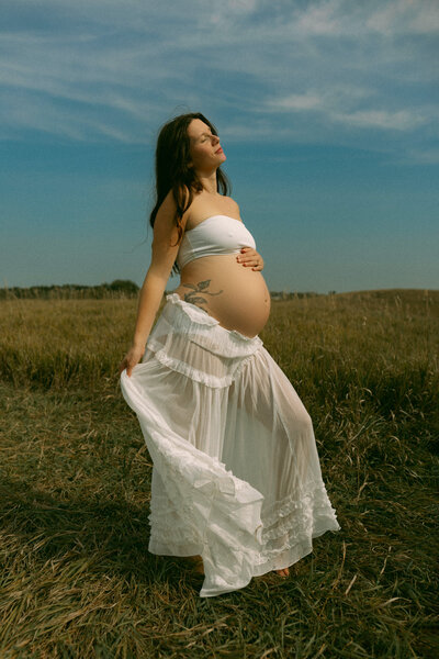 Pregnant mom soaking up the Ames sun.