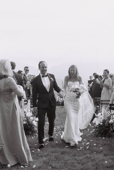 A couple walks down the aisle at their Hudson Valley Wedding