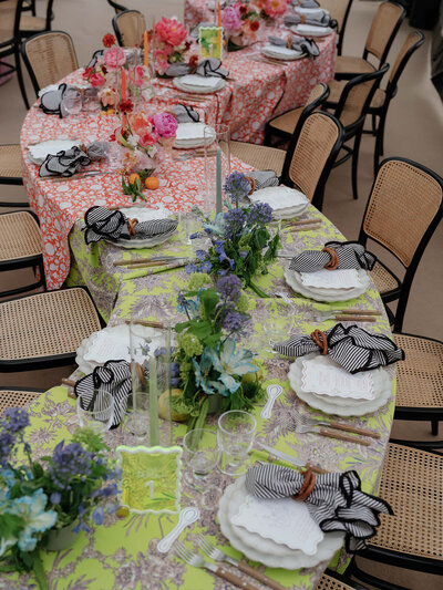 Brightly colored serpentine wedding reception tables