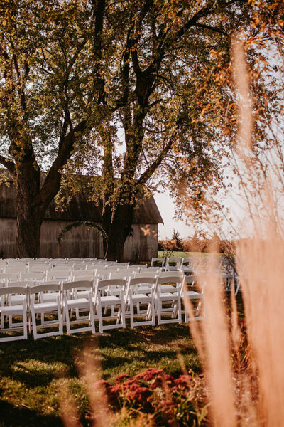 Chairs set up for wedding ceremony on Lincoln Farmstead lawn