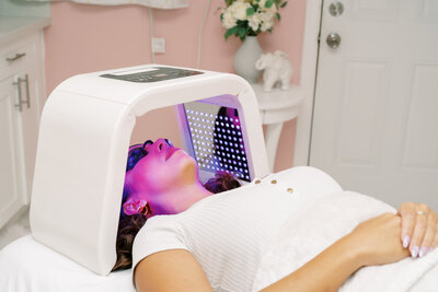 Skin being healed with LED light therapy, Oahu. Anti-aging and acne solutions.