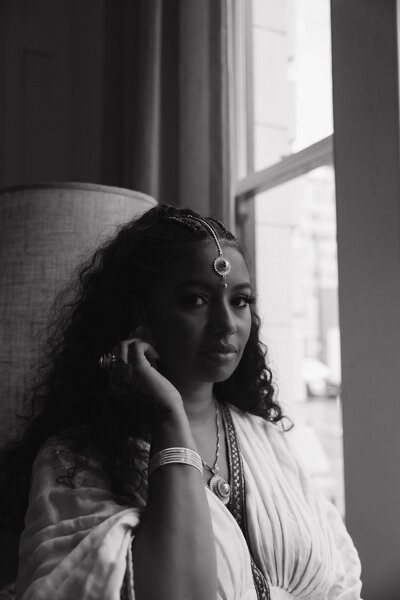 authentic bridal portrait by a window in Colorado